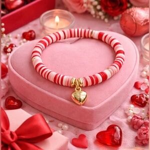 Red and Pink Beaded Bracelet with Gold Heart Charm